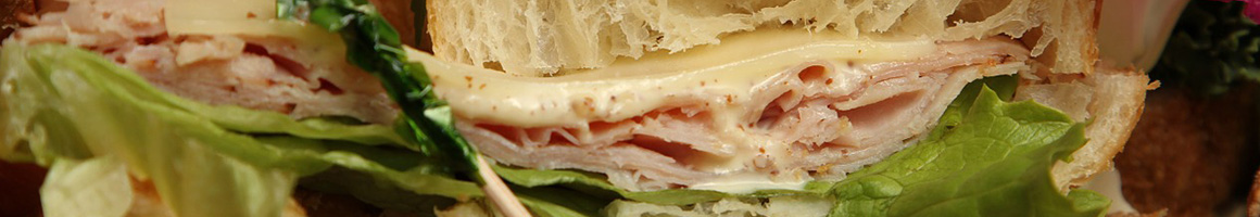 Eating Italian Pizza Sandwich at Mamma Mia's of Hanover restaurant in Hanover, MA.